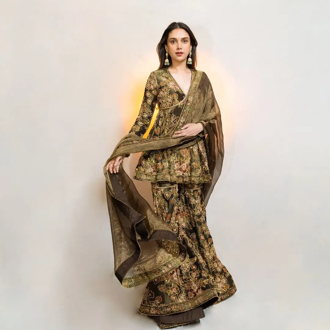 Hindi Actress Aditi Rao Hydari Stills In Green Designer Gown